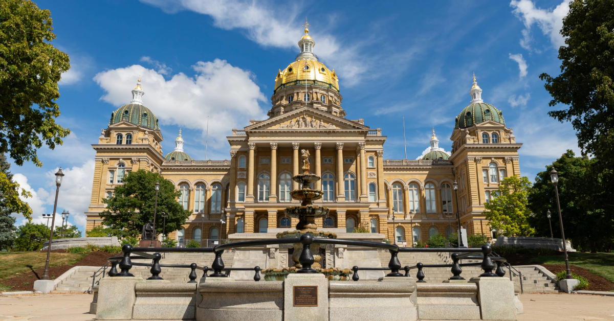 Shot of the Iowa Capitol building against a blue sky background. 